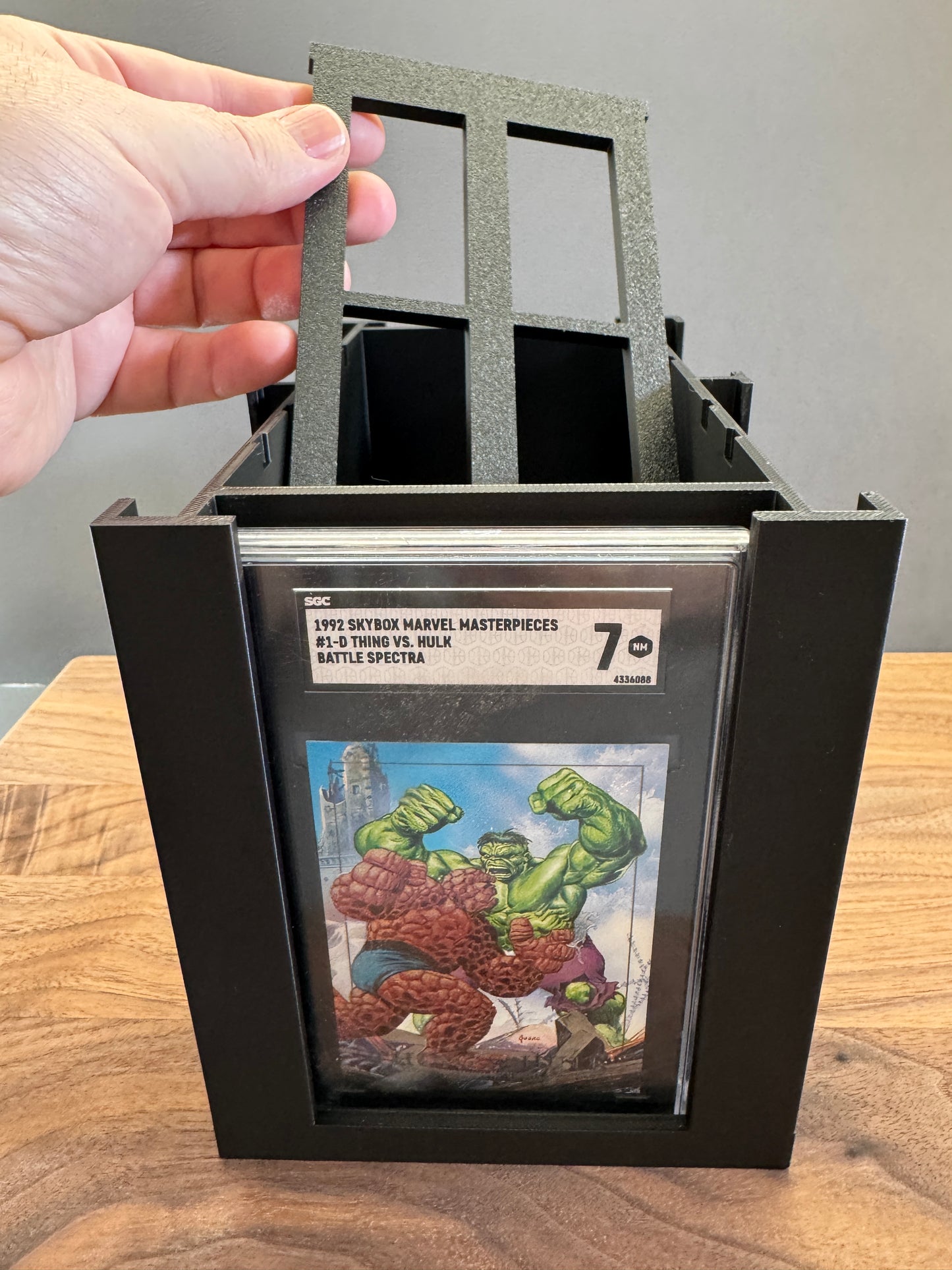 Adjustable divider lifted from the SGC graded card storage box