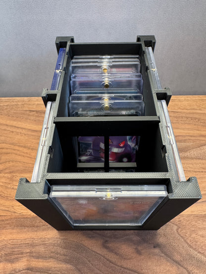 Top view of One Touch Station storing Pokemon cards in one touch cases upright