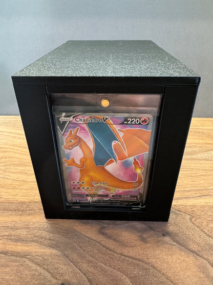 One Touch Station magnetic case display box showing a Charizard V Pokemon card