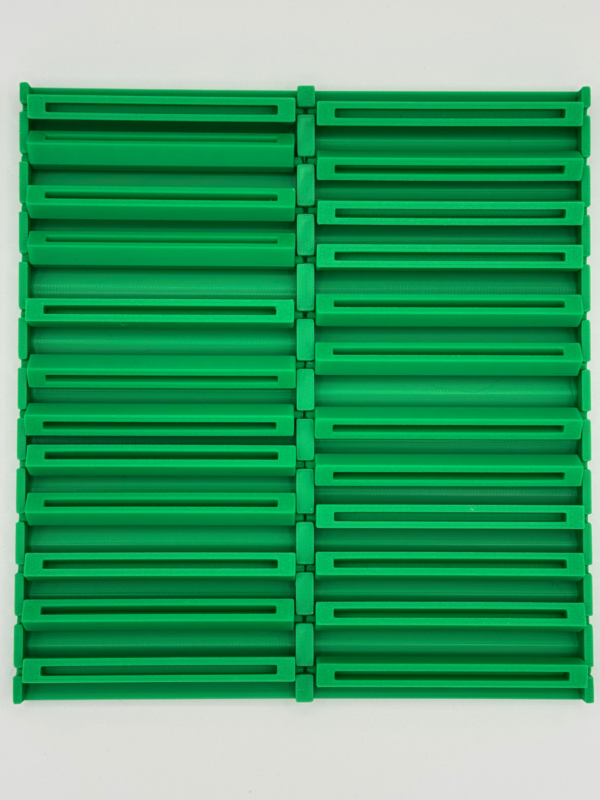 Flip Station dual row card display rack holding 24 top loaders vertically