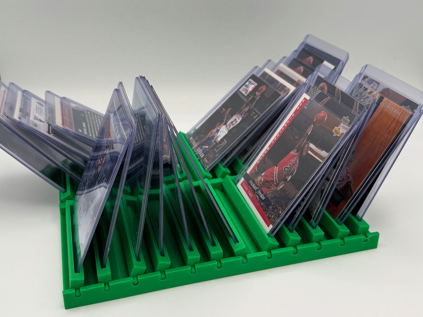 Flip Station top loader display rack - side angle view showing flipping through the cards, dual row design