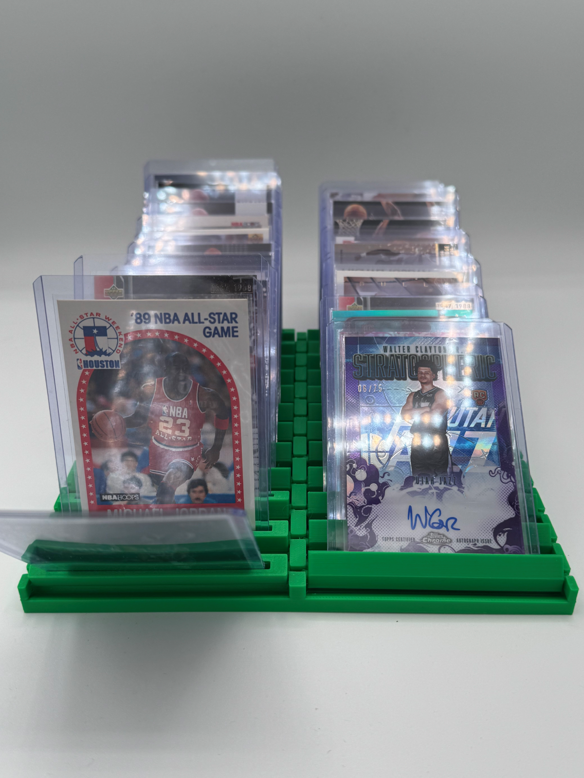 Flip Station 24-card capacity browsing rack for Pokémon and sports card storage showing first card flipped forward to see second card.