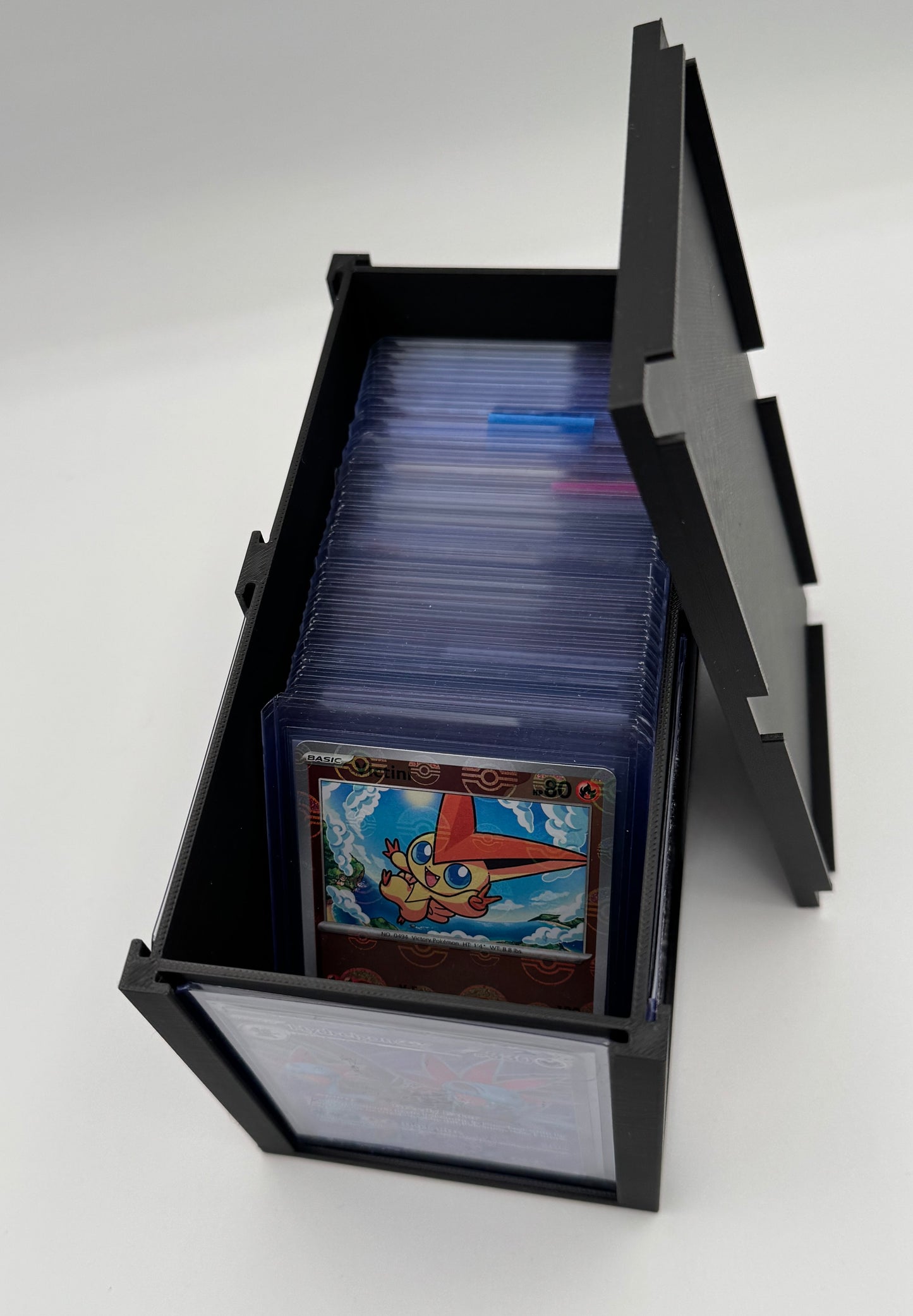 Holder Station, Top loader display box interior storage compartment