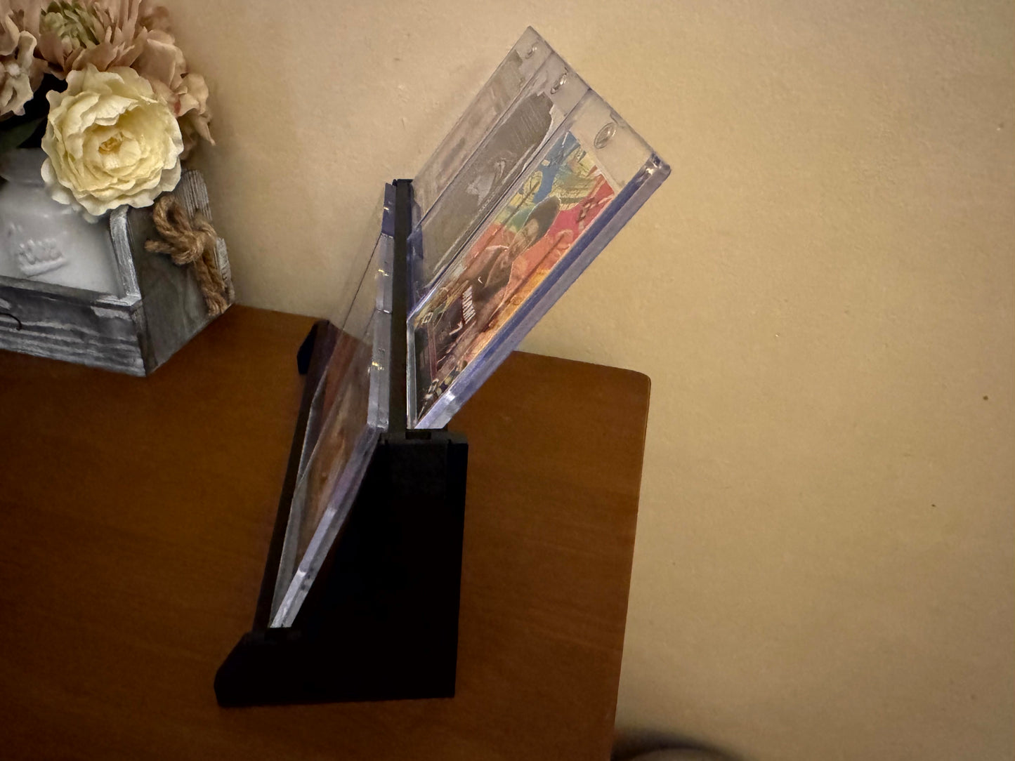 One Touch magnetic case tiered stadium display holding six cases - product photo 5