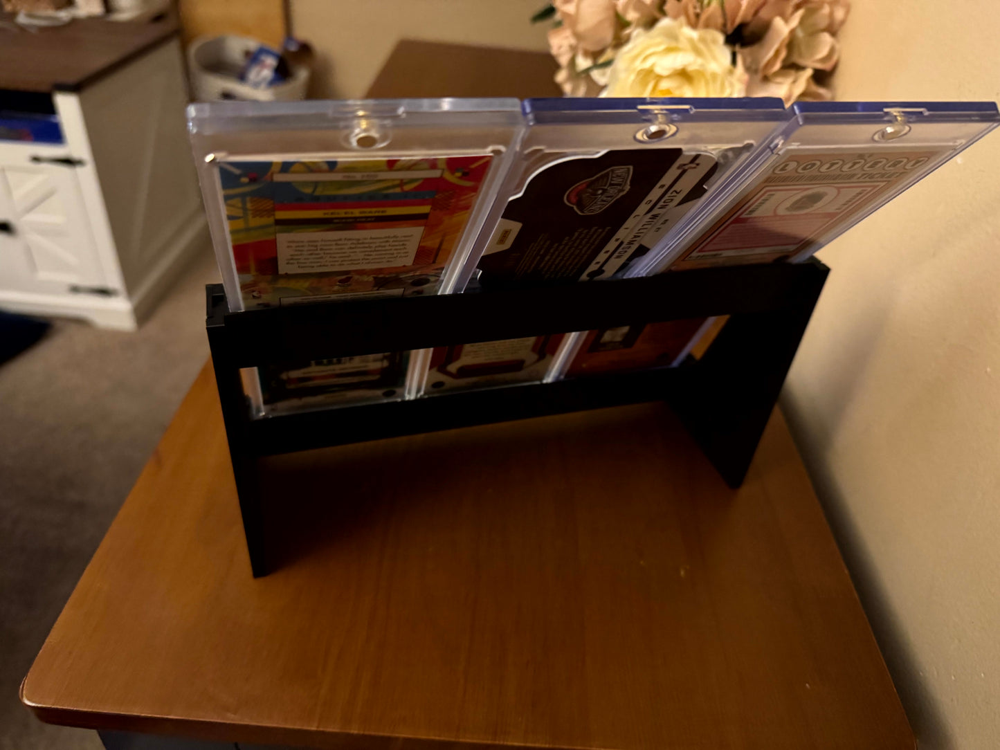 One Touch magnetic case tiered stadium display holding six cases - product photo 6