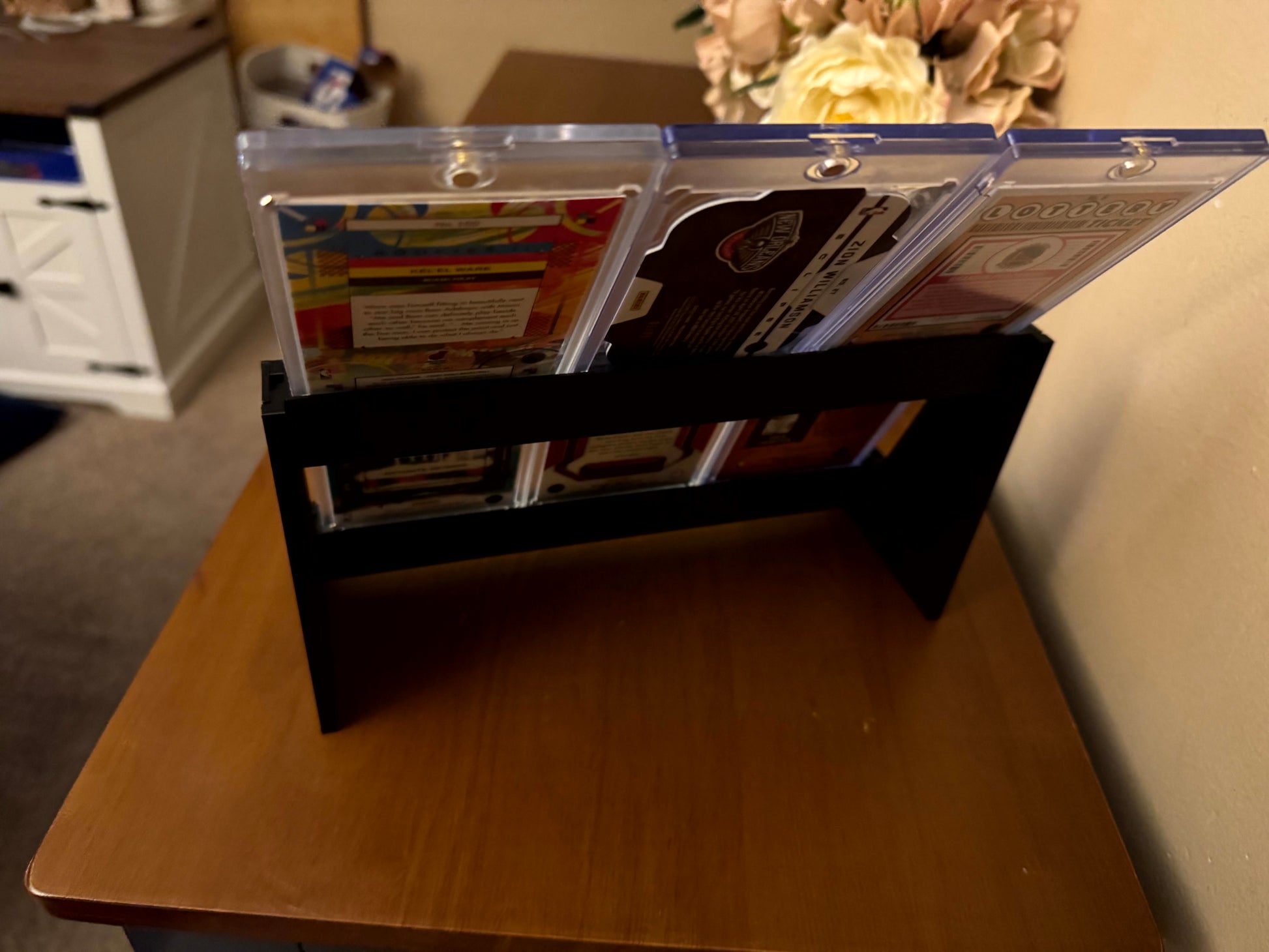 One Touch magnetic case tiered stadium display holding six cases - product photo 6