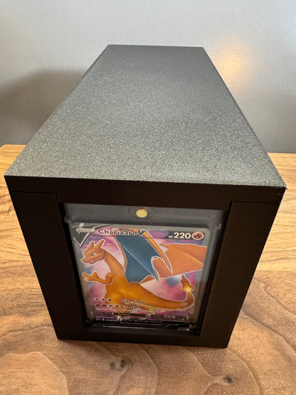 End display slot of the large One Touch box showing a Charizard V Pokemon card