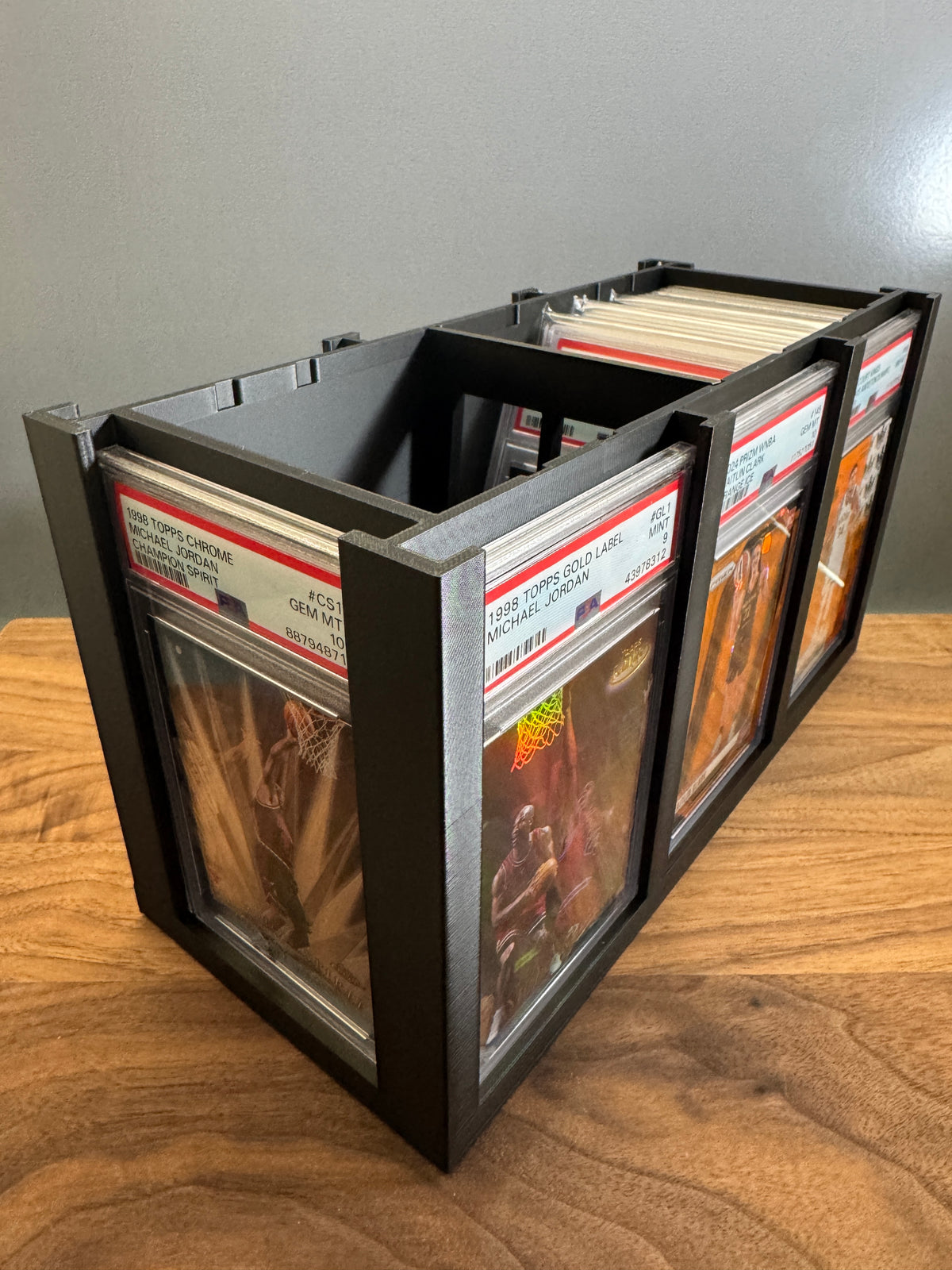 Slab Station Large with the lid removed, PSA Michael Jordan slabs in the exterior display windows and more graded slabs stored inside