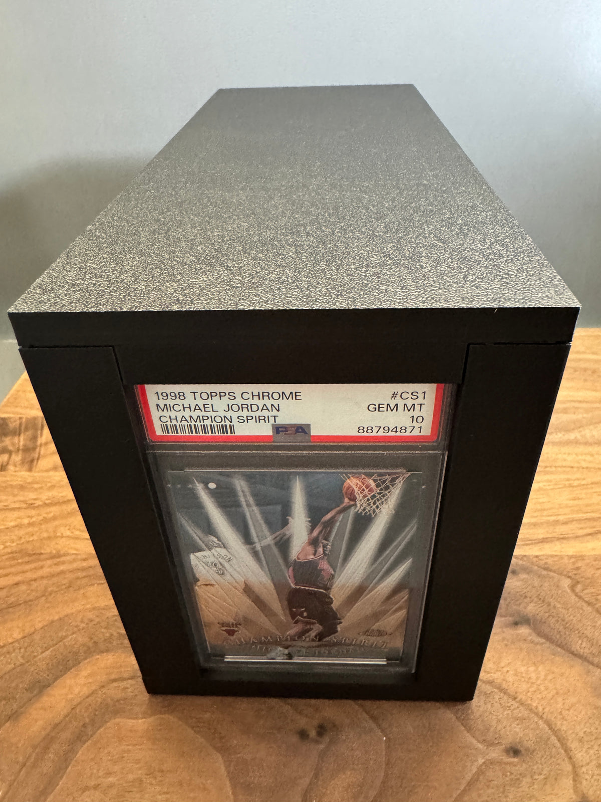 End view of the Slab Station Large graded slab box with a PSA 10 1998 Topps Chrome Michael Jordan in the end display window