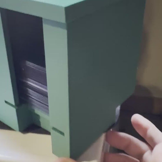 Dispensing Top Loaders from the Top loader and sleeve dispenser station.